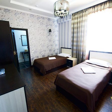 Voyage Hotel Бишкек Стая снимка