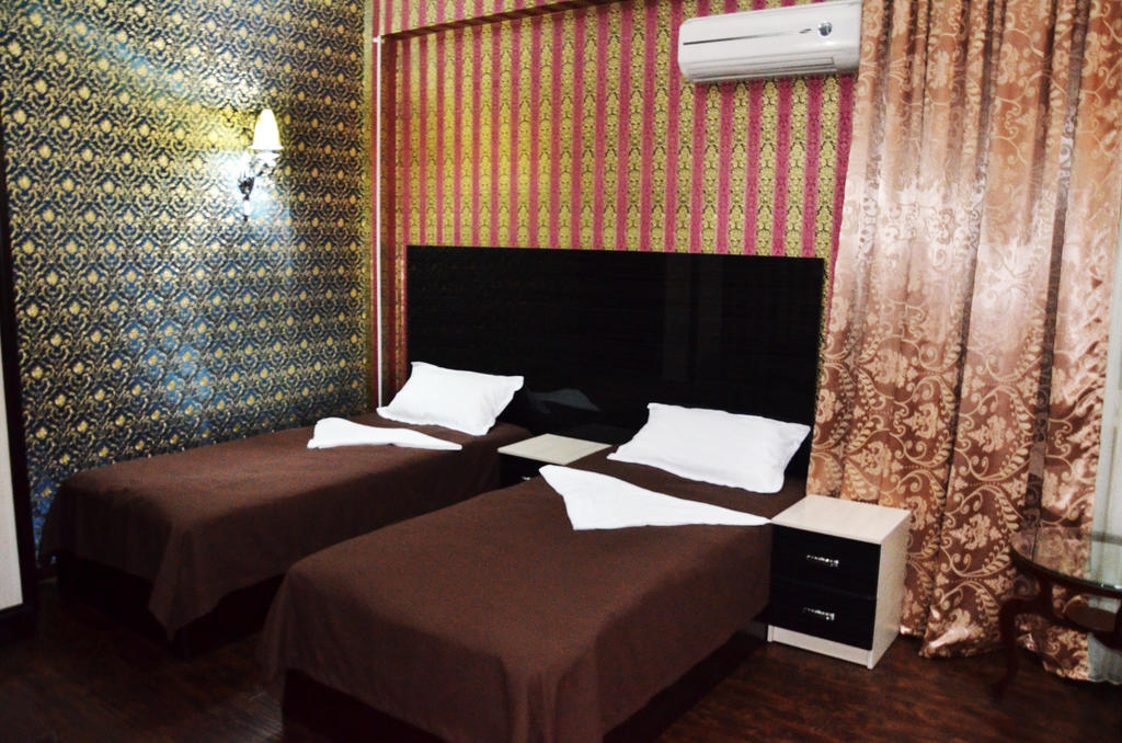 Voyage Hotel Бишкек Стая снимка